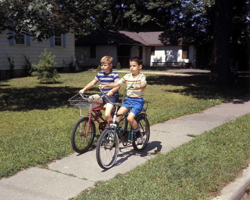 A familiar scene from an earlier American childhood: bicycles, a neighborhood and a widening perimeter of independence